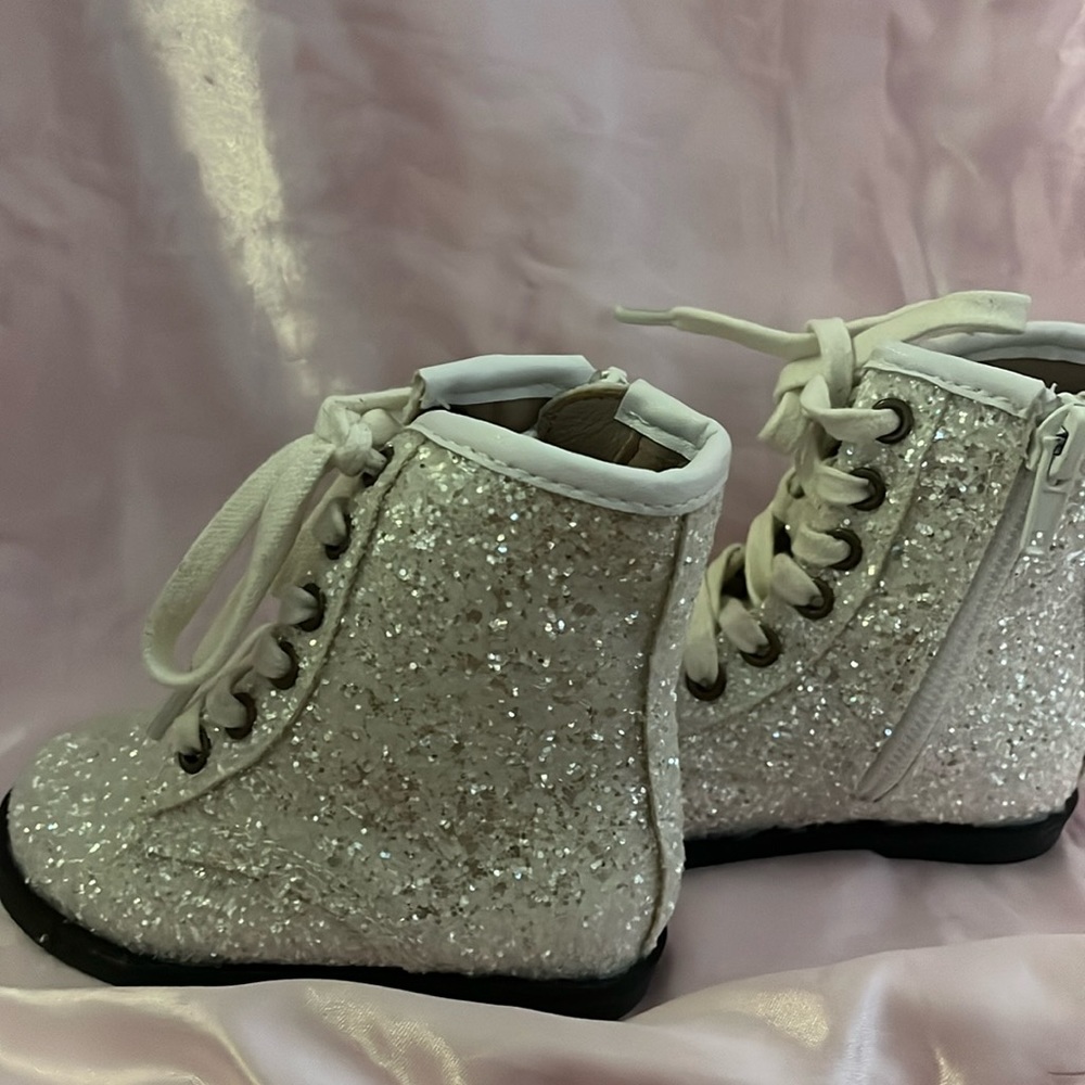 Lace up white sparkly boots